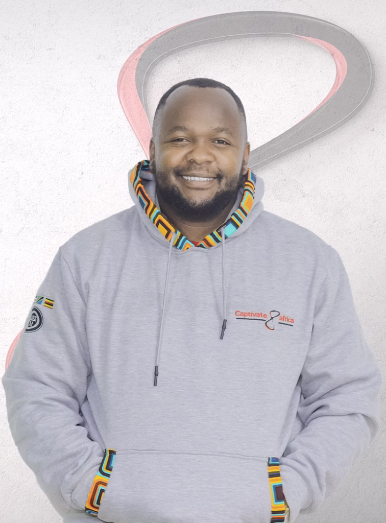 Zabbai Tanki, Accounts Manager Captivate Africa, posing with a branded hoodie.